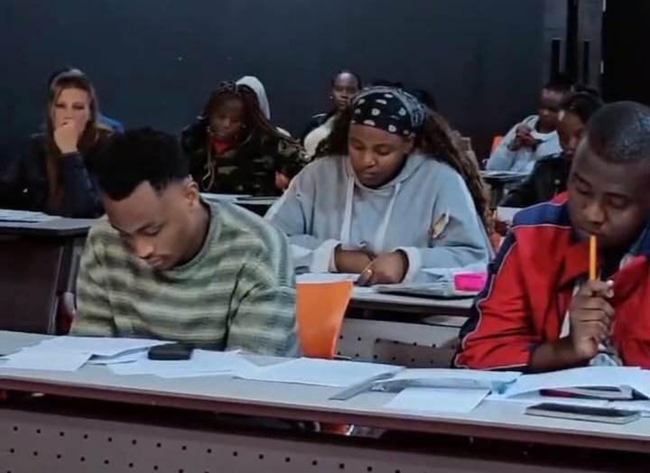 Students taking notes